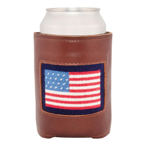 Front face of American Flag needlepoint can cooler showing hand-stitched needlepoint American Flag against a dark navy blue background. Soft leather body with interior neoprene lining. Great fit for a standard 12 ounce can.