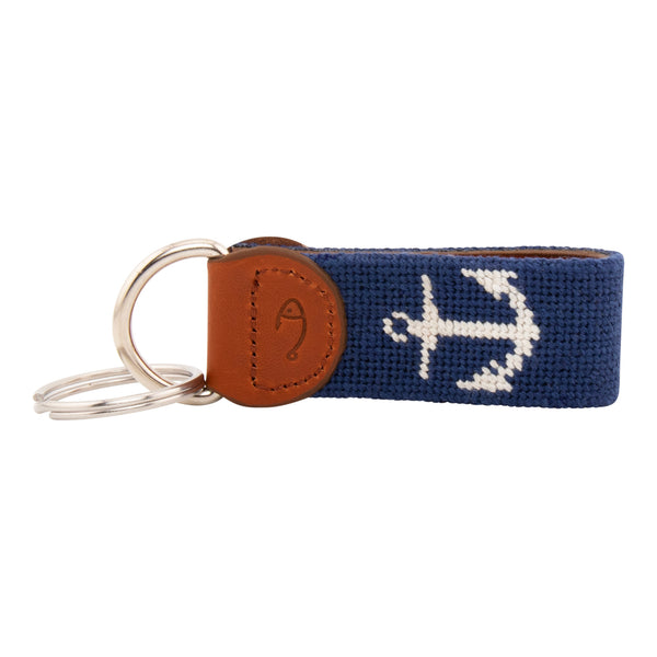 Hand-stitched needlepoint keychain, ship's anchor design in white on both sides with navy blue background high-quality leather and cotton thread, stainless steel D-ring and keyring.
