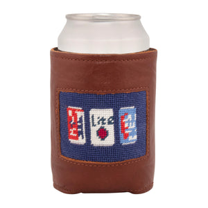 Front face of beer can needlepoint can cooler showing hand-stitched needlepoint beer cans with dark navy blue background. Soft leather body with interior neoprene lining. Great fit for a standard 12 ounce can.