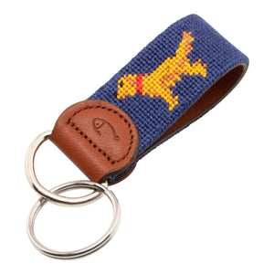 Hand-stitched Golden Retriever needlepoint keychain showing a golden retriever on both sides against a navy blue background and leather backing.  Stainless steel D-ring and keyring.