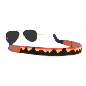 mountain range needlepoint sunglass strap showing a western mountain range inspired design with sturdy cotton covered silicone ear connectors and a soft leather backing