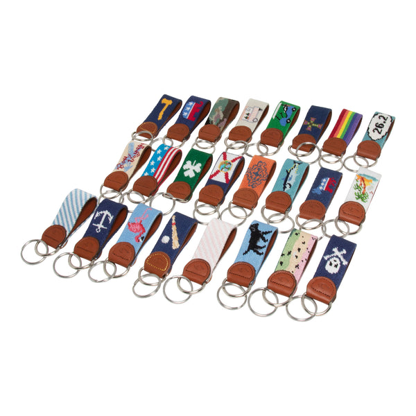 Huck Venture Needlepoint Keychain collection showing all handmade needlepoint key fobs in our catalog