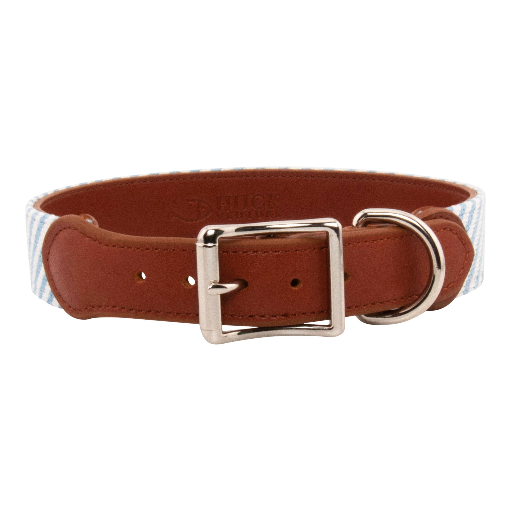 Seersucker Needlepoint Dog Collar with a classic blue and white seersucker pattern. The dog collar has durable stainless steel and full grain leather backing and strap.