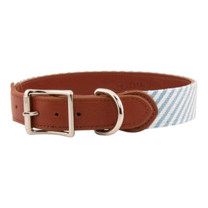 Seersucker Needlepoint Dog Collar with a classic blue and white seersucker pattern. The dog collar has durable stainless steel and full grain leather backing and strap.