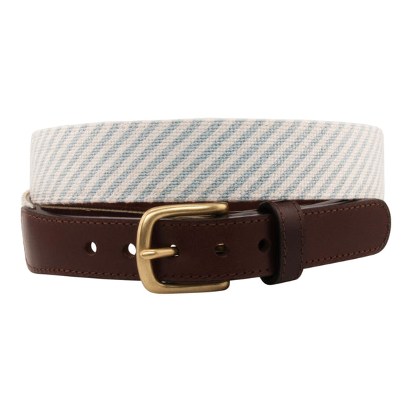 Seersucker Needlepoint Belt with a classic blue and white seersucker pattern.  Belt has a brass buckle and full grain leather backing and strap.