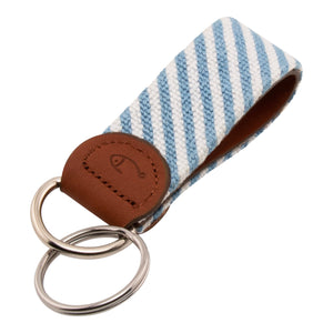 needlepoint keychain blue and white seersucker pattern design wraps around to both sides, hand-stitched, leather background, stainless steel key ring, same design on both sides