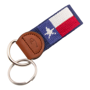 Hand-stitched Texas Flag needlepoint keychain showing a Texas Flag on both sides against a navy blue background and leather backing.  Stainless steel D-ring and keyring.
