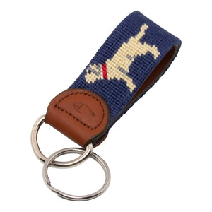 Hand-stitched yellow Labrador needlepoint keychain showing a yellow lab on both sides against a navy blue background and leather backing.  Stainless steel D-ring and keyring.