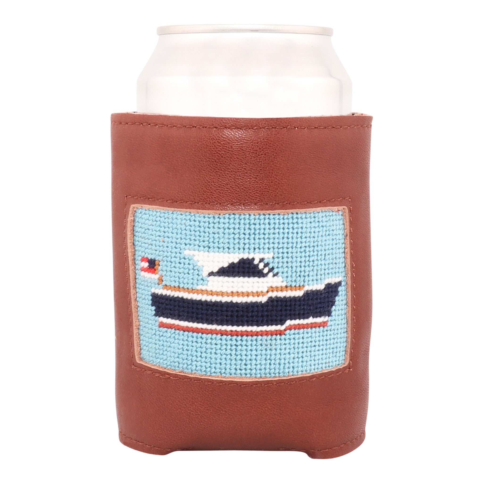 Hand-stitched boat needlepoint can cooler with brown leather trim, designed to insulate 12 oz. cans—coastal accessory by Huck Venture.