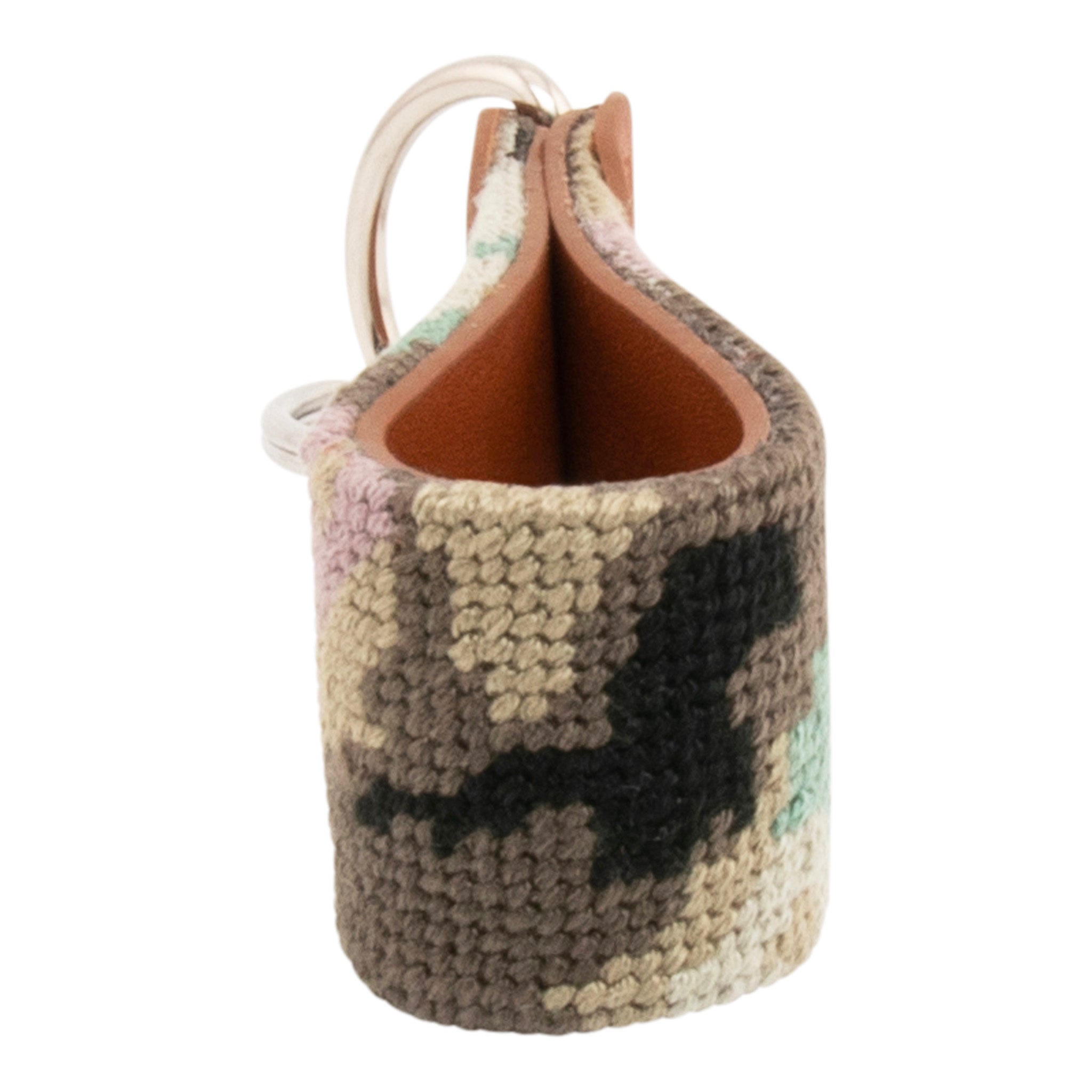 Needlepoint keychain with jungle camo hand-stitched pattern on both sides, leather backing, stainless steel hardware