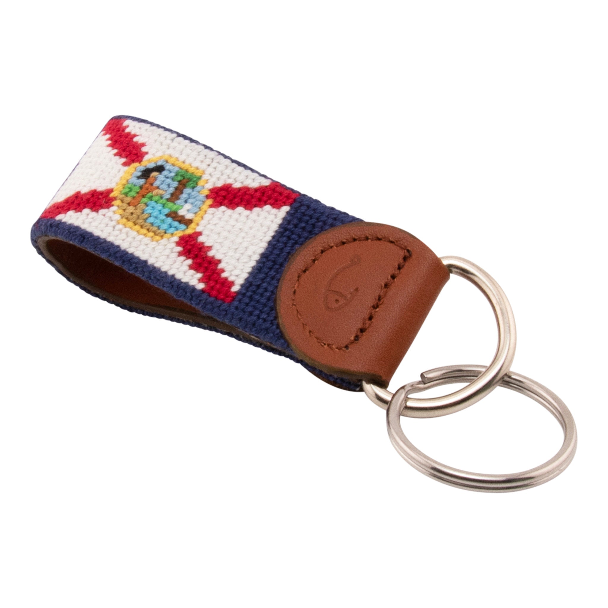 Hand-stitched Florida Flag needlepoint keychain showing the Florida Flag on both sides against a navy blue background and leather backing.  Stainless steel D-ring and keyring.