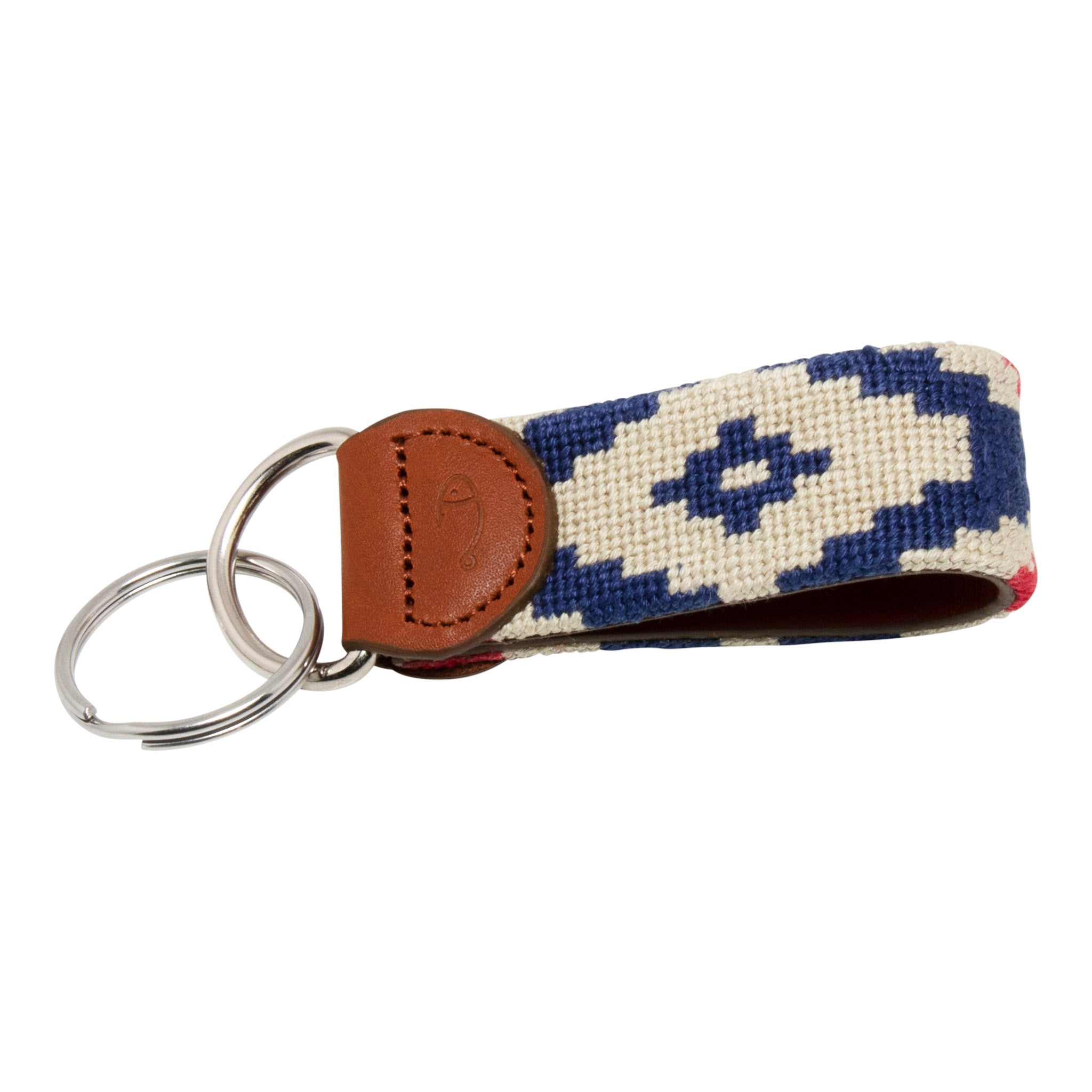 Hand-stitched Gaucho needlepoint keychain showing a red white and blue gaucho pattern on both sides with leather backing.  Stainless steel D-ring and keyring.