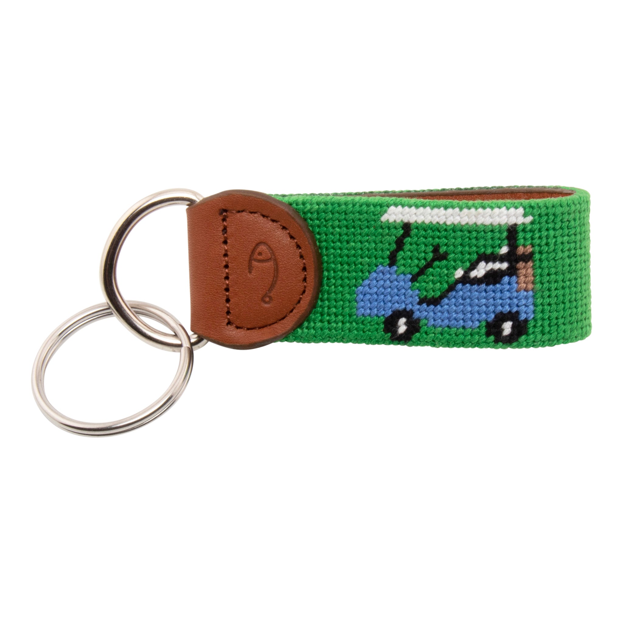 Hand-stitched golfing themed needlepoint keychain showing crossed golf clubs on both sides against a green background and leather backing.  Stainless steel D-ring and keyring.