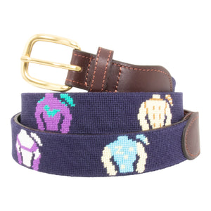 Jockey Silk Needlepoint Belt with navy blue background showing a repeating pattern of colorful racing jockey silks and cap. Belt has a brass buckle and full grain leather backing and strap.