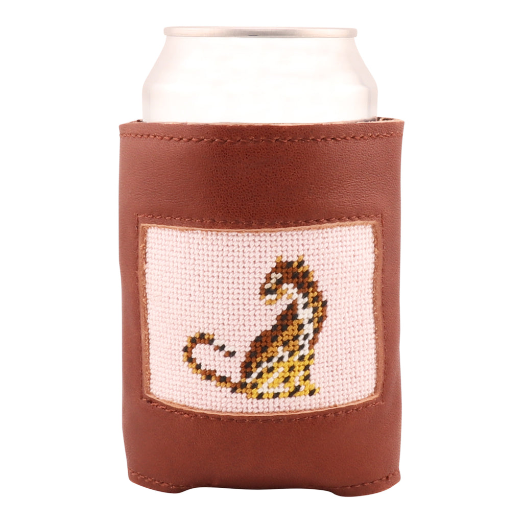 Hand-stitched leopard needlepoint can cooler with full-grain brown leather, featuring a pink canvas background and insulation for 12 oz cans and bottles.
