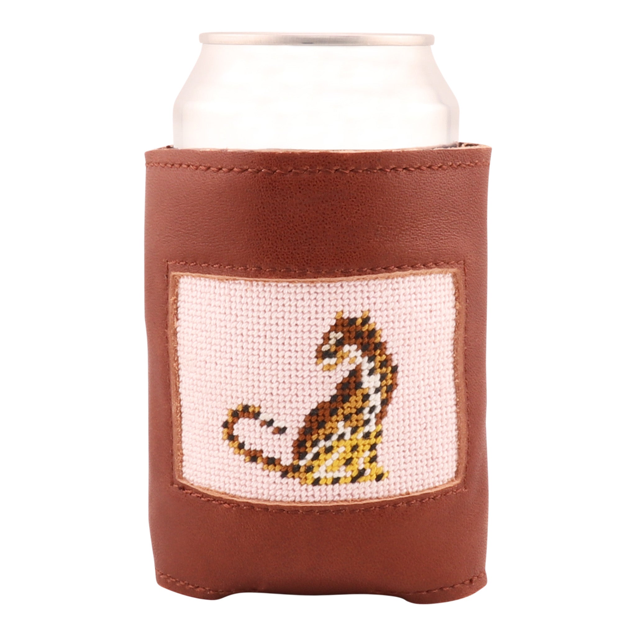 Hand-stitched leopard needlepoint can cooler with full-grain brown leather, featuring a pink canvas background and insulation for 12 oz cans and bottles.