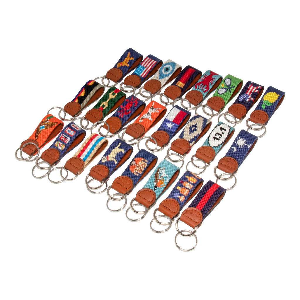 Huck Venture Needlepoint Keychain collection showing all handmade needlepoint key fobs in our catalog
