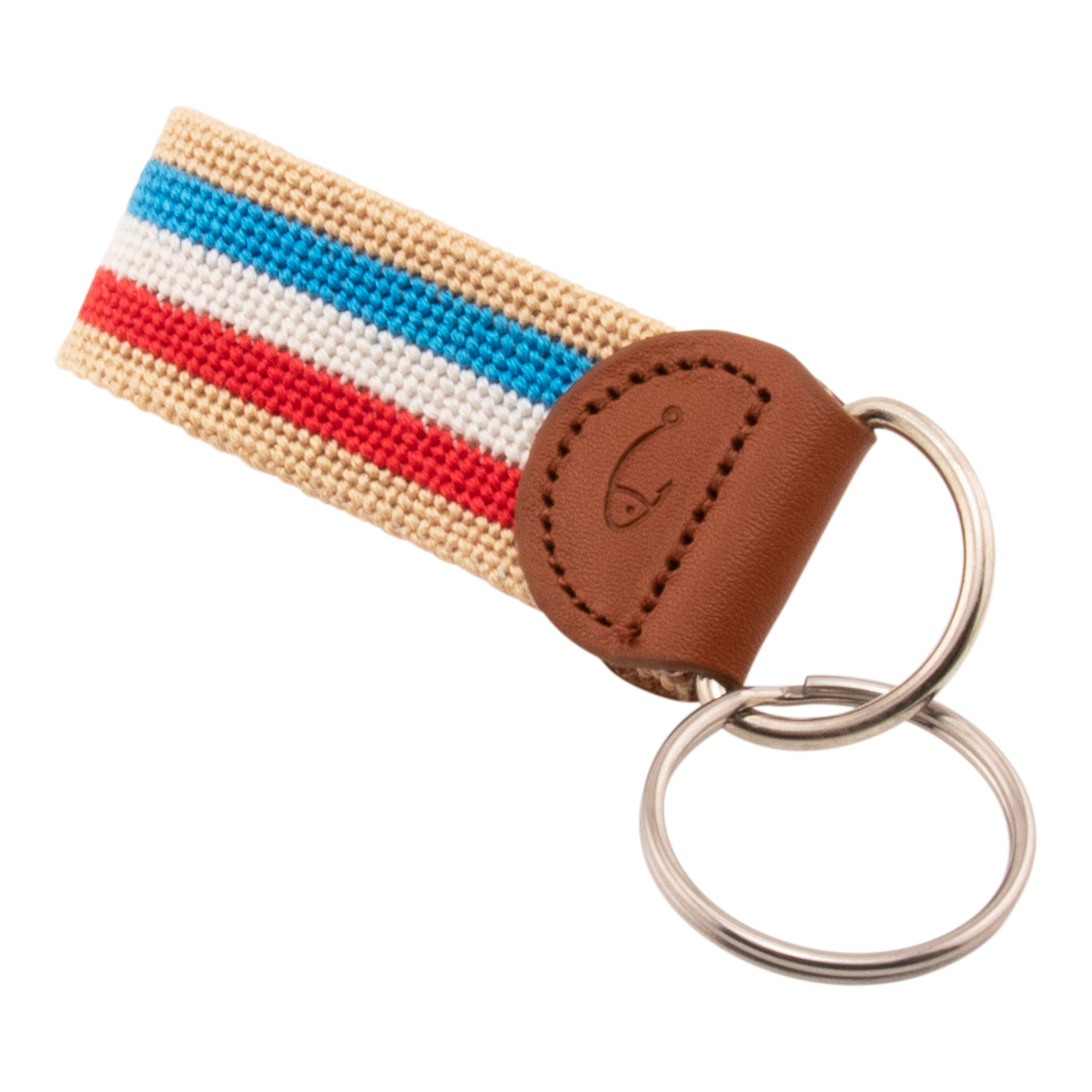 needlepoint keychain with blue white and red stripes on light tan background, design wraps around to both sides, hand-stitched, leather background, stainless steel key ring, same design on both sides