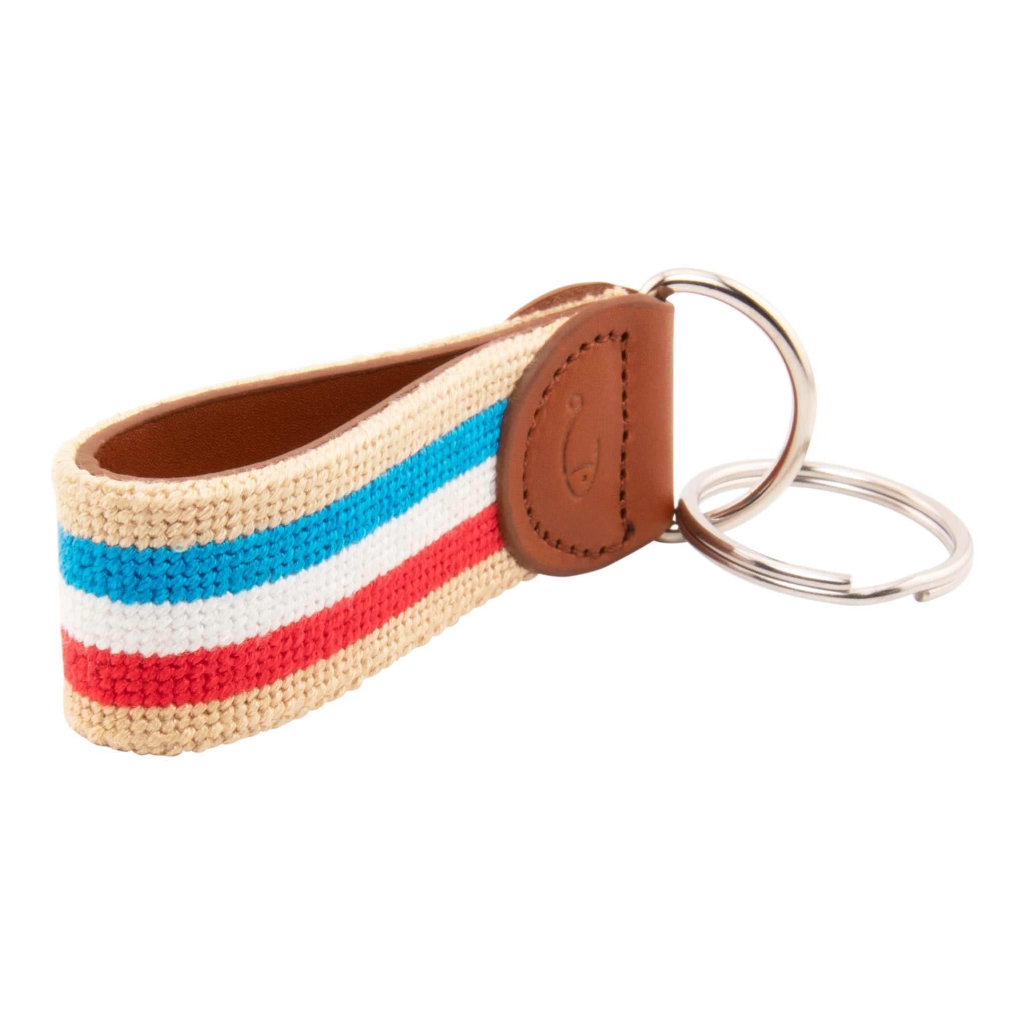 needlepoint keychain with blue white and red stripes on light tan background, design wraps around to both sides, hand-stitched, leather background, stainless steel key ring, same design on both sides