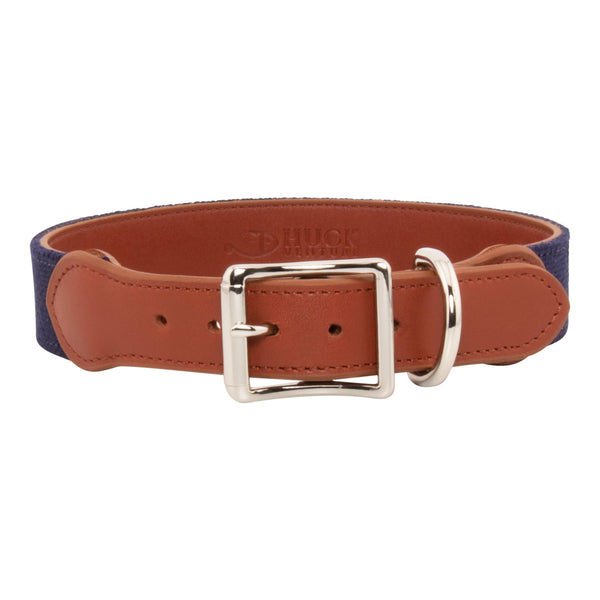 Patriotic Dog Needlepoint Dog Collar with navy blue background showing a repeating pattern of evenly spaced dog silhouette filled with the pattern of the American Flag. The dog collar has durable stainless steel and full grain leather backing and strap.