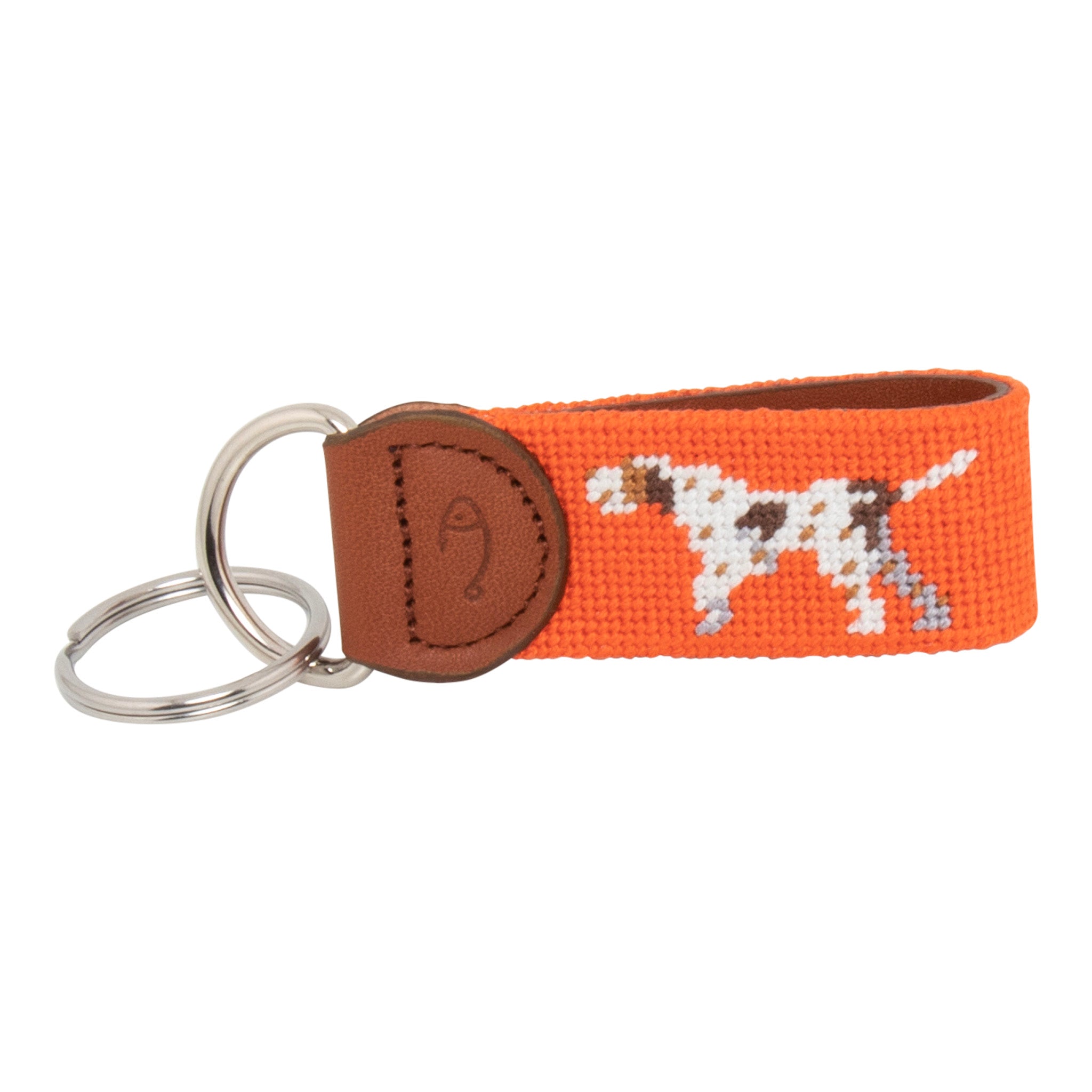 Hand-stitched Pointer Dog needlepoint keychain showing a dog in pointing stance on both sides against a blaze orange background and leather backing.  Stainless steel D-ring and keyring.