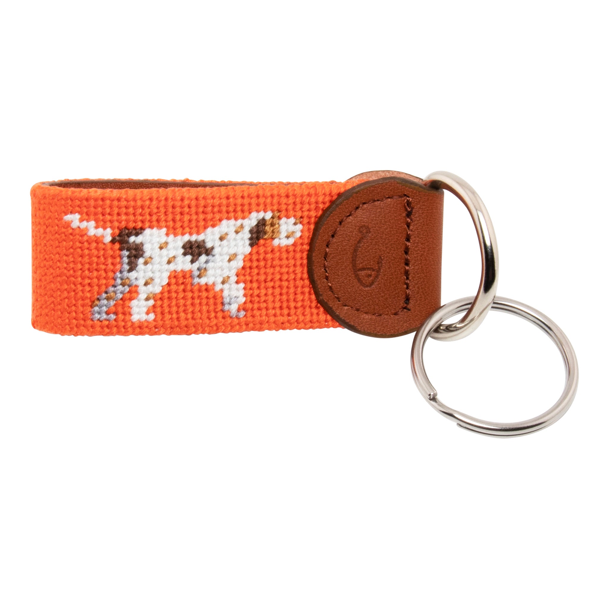 Hand-stitched Pointer Dog needlepoint keychain showing a dog in pointing stance on both sides against a blaze orange background and leather backing.  Stainless steel D-ring and keyring.