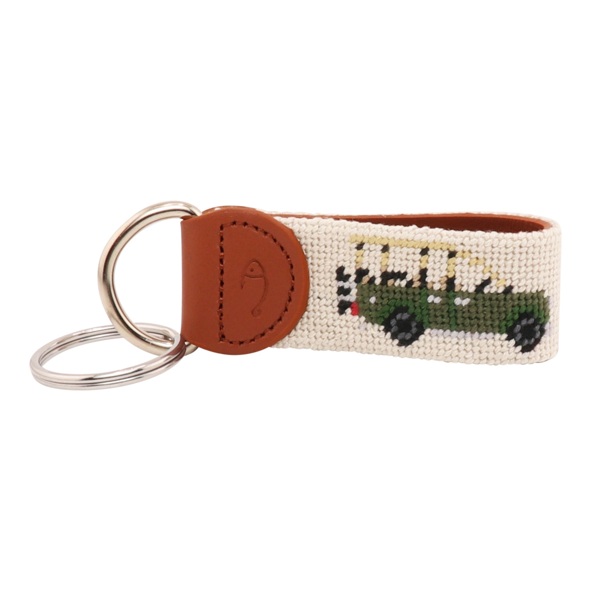 Hand-stitched Safari Needlepoint Key Fob with green safari vehicle design, full-grain leather backing, and stainless steel key ring by Huck Venture.
