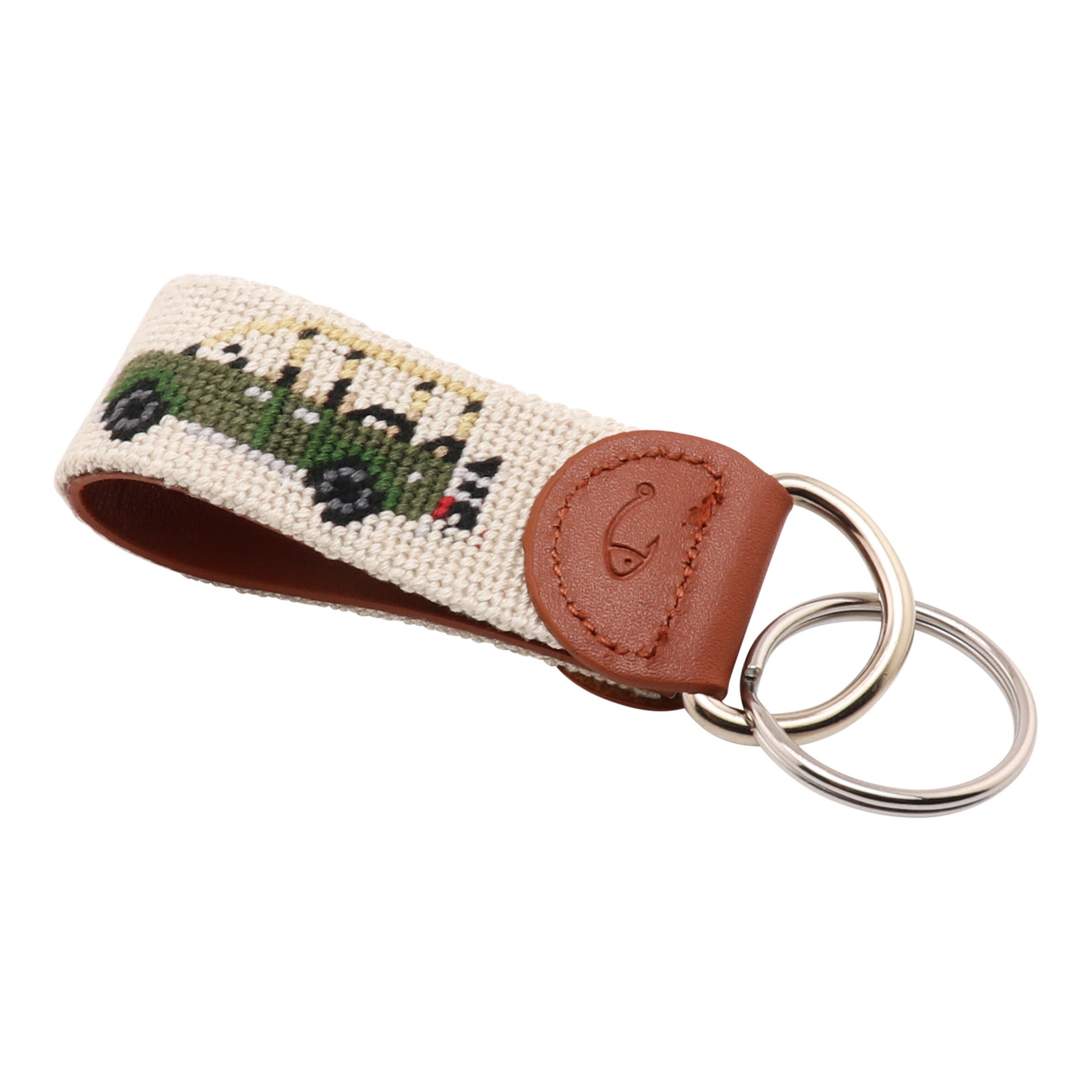 Hand-stitched Safari Needlepoint Key Fob with green safari vehicle design, full-grain leather backing, and stainless steel key ring by Huck Venture.