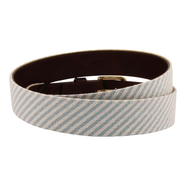 Seersucker Needlepoint Belt with a classic blue and white seersucker pattern.  Belt has a brass buckle and full grain leather backing and strap.