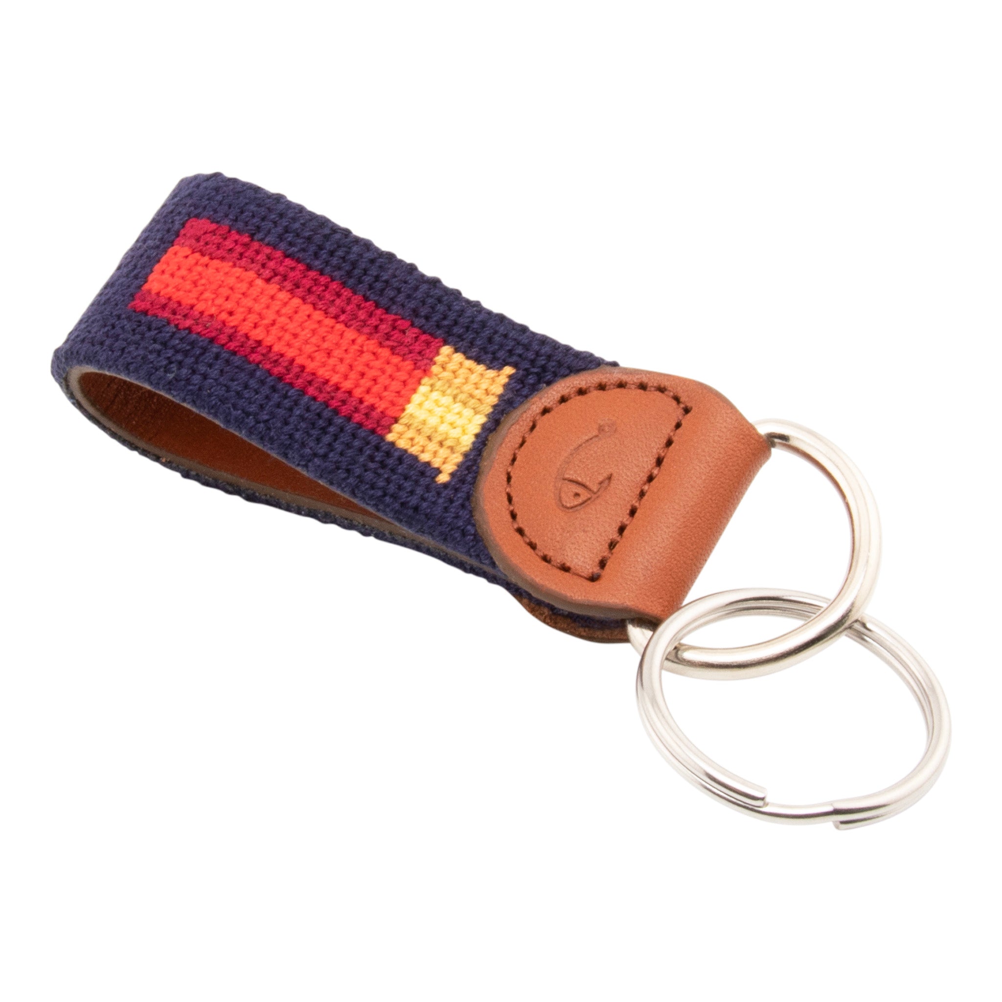 Hand-stitched shotgun shell needlepoint keychain showing a classic red shotgun shell on both sides against a navy blue background and leather backing.  Stainless steel D-ring and keyring.