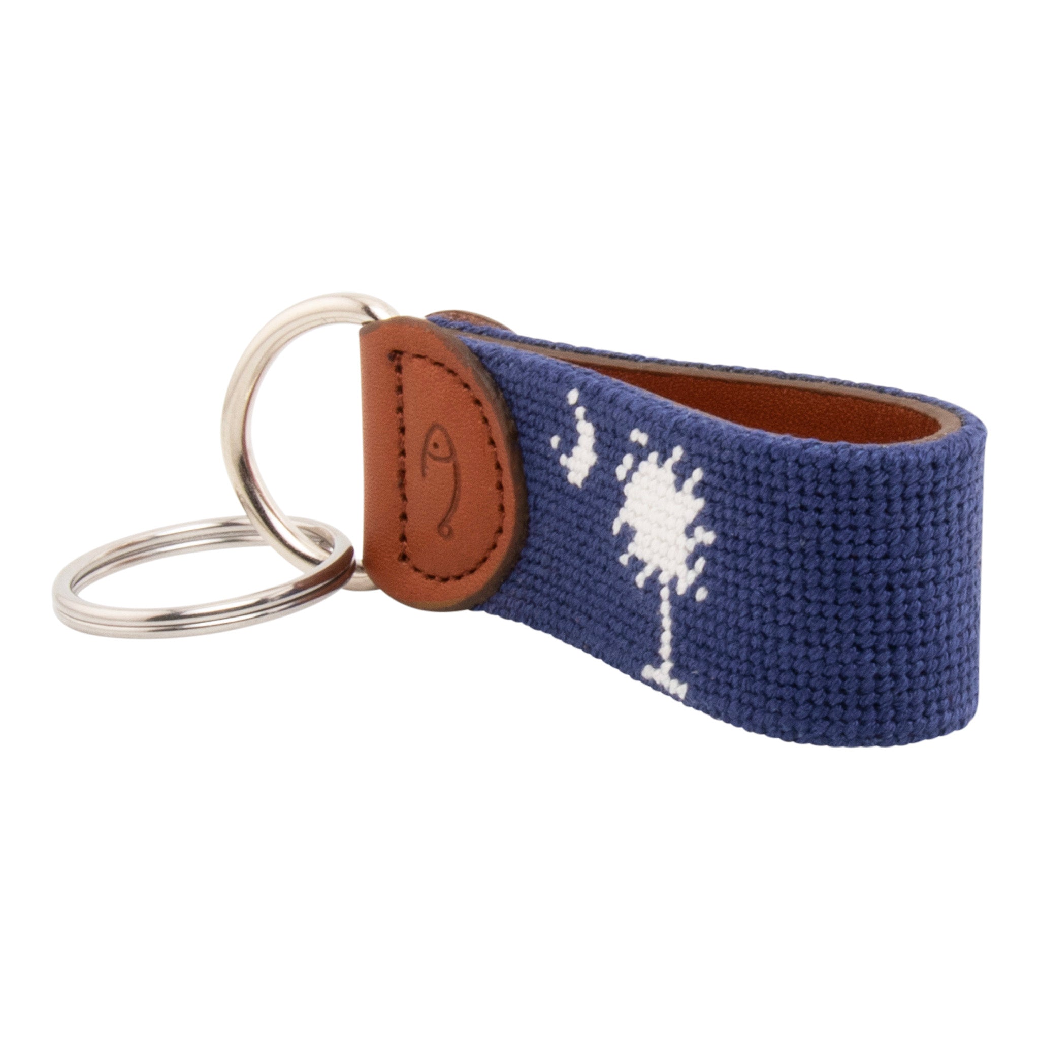 needlepoint keychain showing South Carolina State Flag against navy blue background, Palmetto and crescent, same design on both sides hand-stitched, leather backing with stainless steel keyring