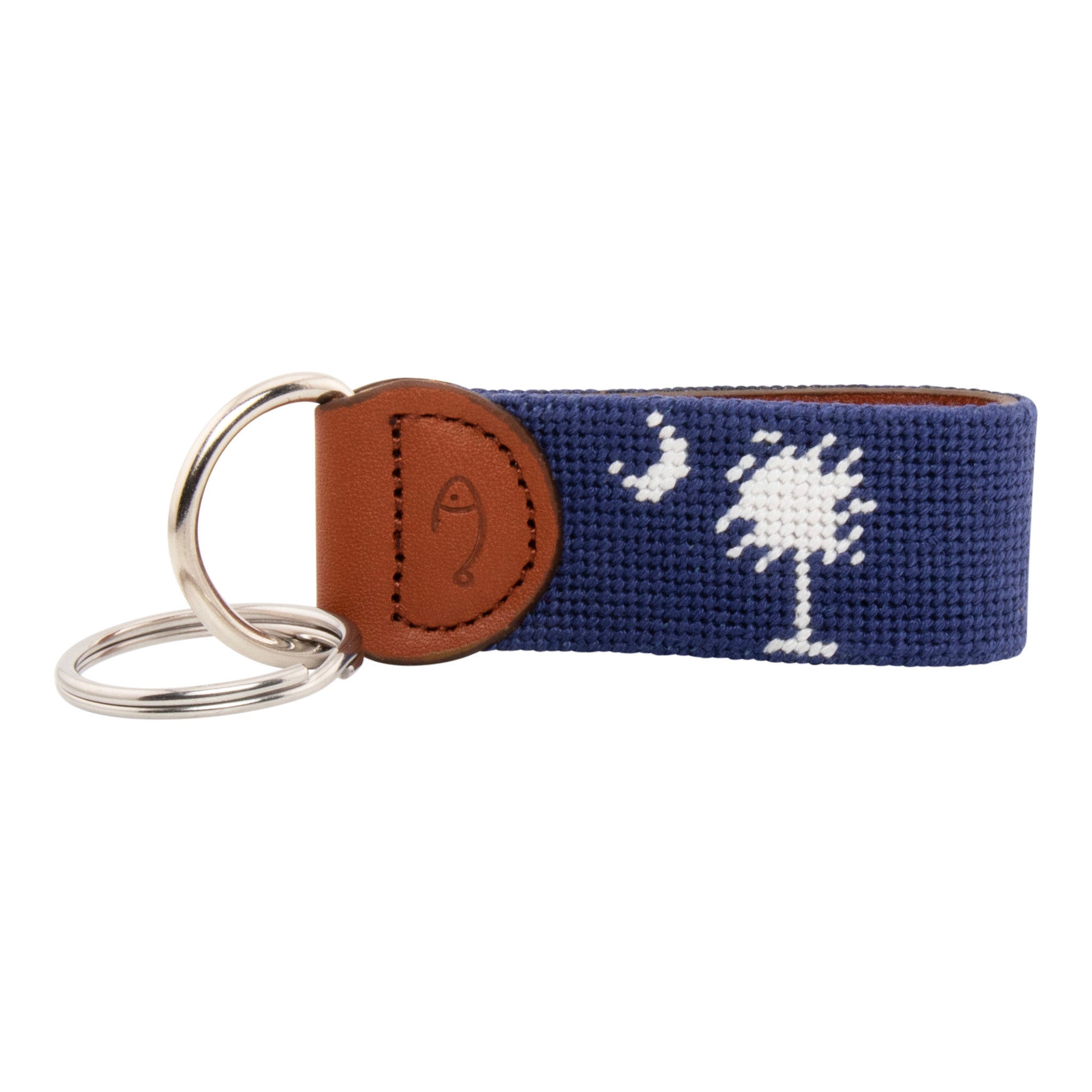 needlepoint keychain showing South Carolina State Flag against navy blue background, Palmetto and crescent, same design on both sides hand-stitched, leather backing with stainless steel keyring