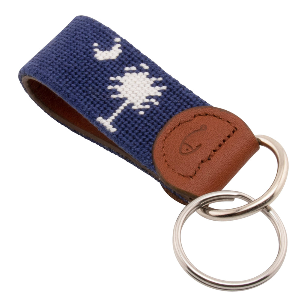 needlepoint keychain showing South Carolina State Flag against navy blue background, Palmetto and crescent, same design on both sides hand-stitched, leather backing with stainless steel keyring