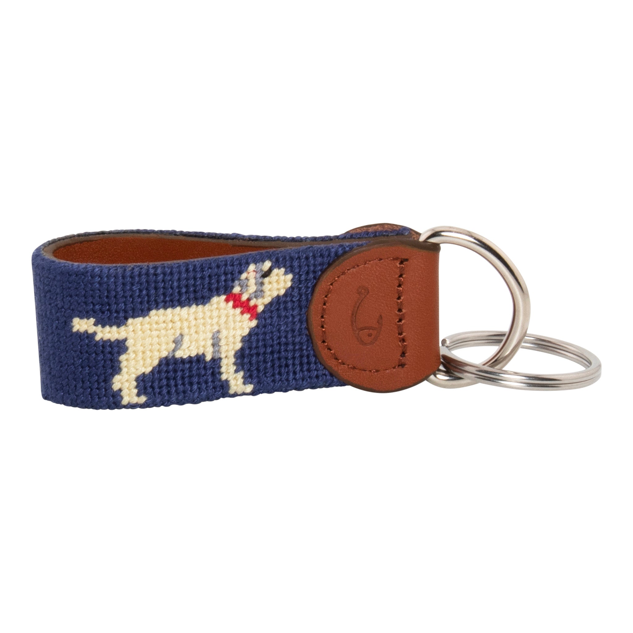 Hand-stitched yellow Labrador needlepoint keychain showing a yellow lab on both sides against a navy blue background and leather backing.  Stainless steel D-ring and keyring.